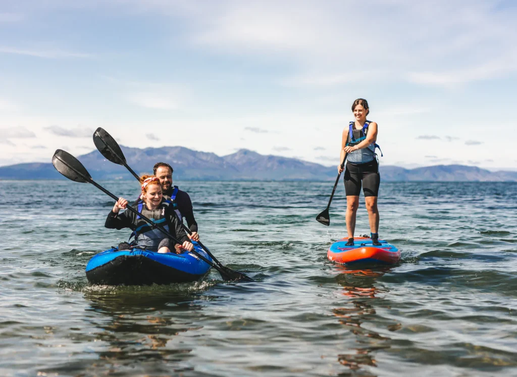 BL3 HERO IMAGE Width 1440x Height 1050px Head to head paddle boarding vs kayaking